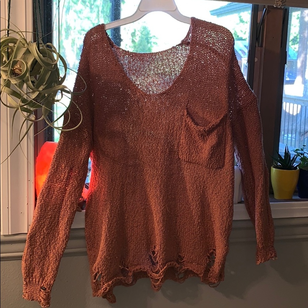 Cute rustic orange sweater!